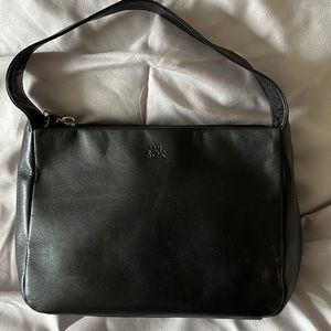 The Sak vintage small black leather purse.